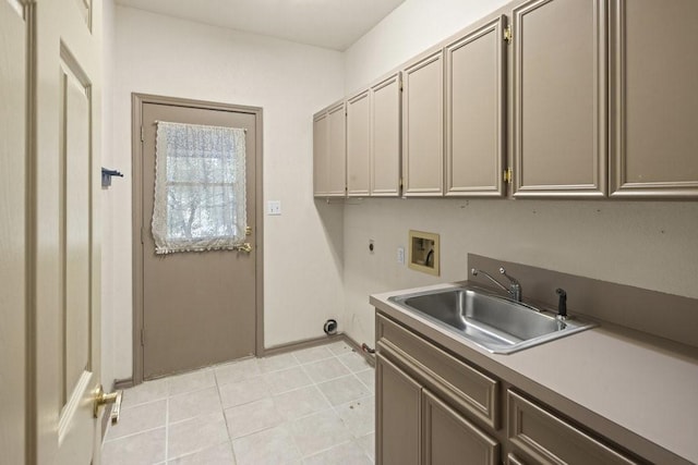 300 Delaware Springs Blvd, Burnet, TX 78611 - laundry room with cabinet space, hookup for a washing machine, and light tile patterned floors