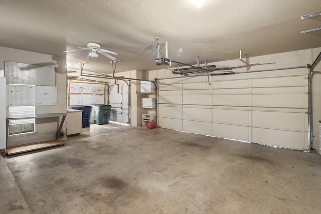 300 Delaware Springs Blvd, Burnet, TX 78611 - garage with a garage door opener and ceiling fan