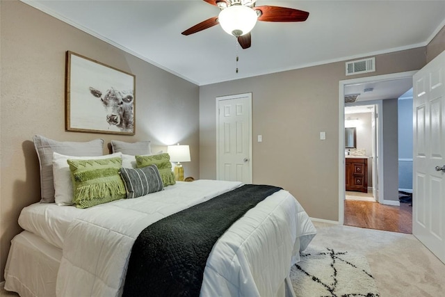 4159 Steck Ave Unit 290, Austin, TX 78759 - bedroom with light carpet, ornamental molding, ceiling fan, and baseboards