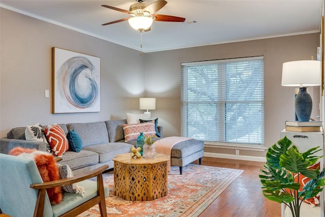 4159 Steck Ave Unit 290, Austin, TX 78759 - living area with a ceiling fan, wood finished floors, baseboards, and crown molding