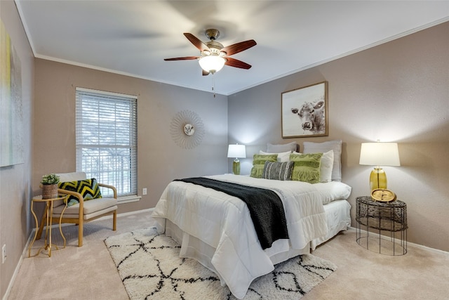 bedroom with light carpet, crown molding, and ceiling fan