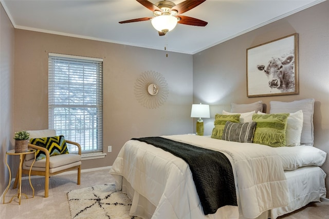 bedroom with ornamental molding, light carpet, and ceiling fan