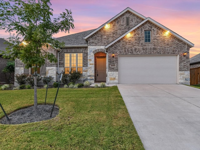 view of front of home with a yard