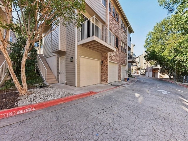 view of building exterior featuring a garage