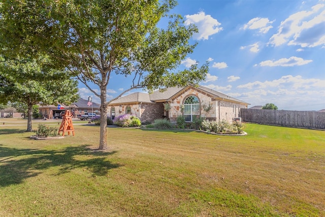 view of front of property with a front yard