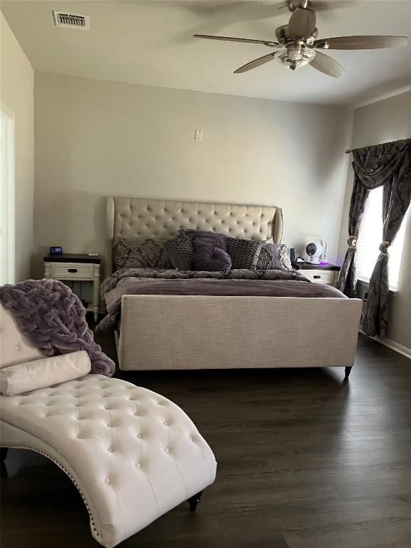 13708 Cantarra Dr, Pflugerville, TX 78660 - bedroom with dark wood-style floors and ceiling fan