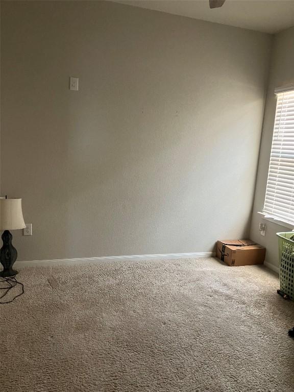 13708 Cantarra Dr, Pflugerville, TX 78660 - carpeted empty room featuring baseboards