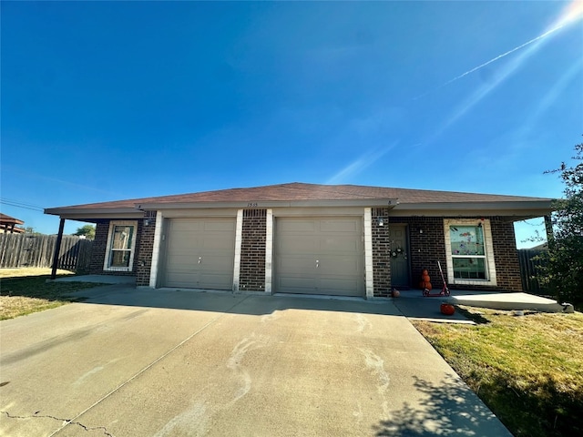 ranch-style home with a garage