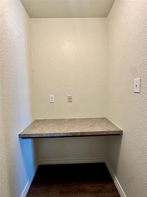 interior space featuring dark wood-type flooring