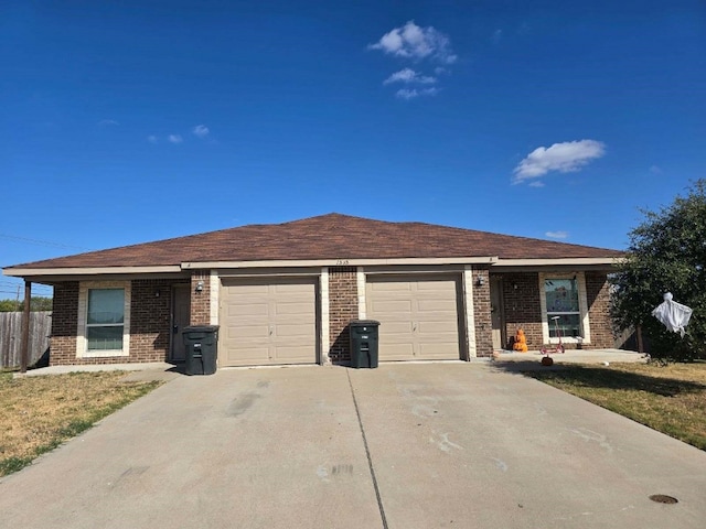 single story home with a garage