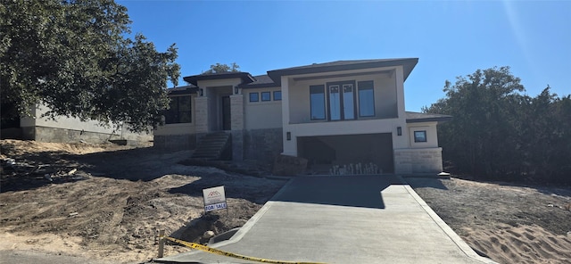 prairie-style house with a garage