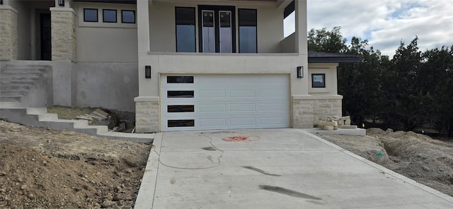 exterior space with concrete driveway