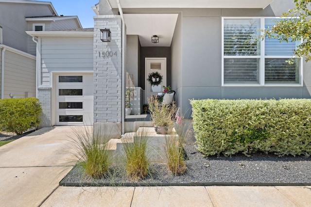 property entrance with a garage