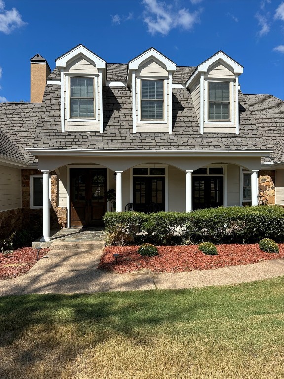 view of new england style home