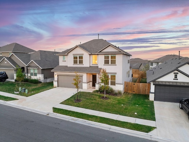 view of front of home featuring a lawn