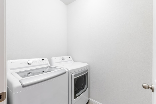 laundry area featuring separate washer and dryer