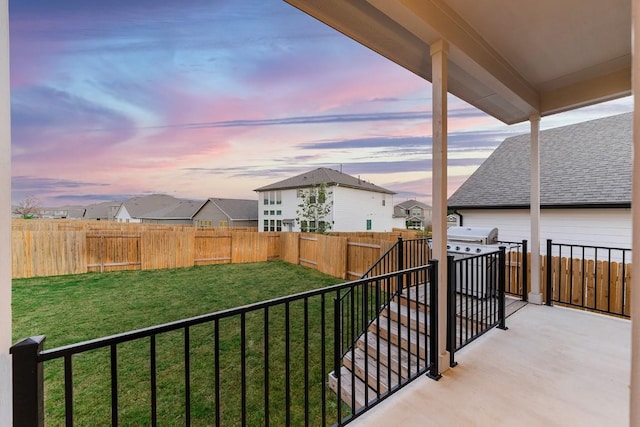 309 Greenway Dr, Georgetown, TX 78628 - patio terrace at dusk with a fenced backyard and a residential view