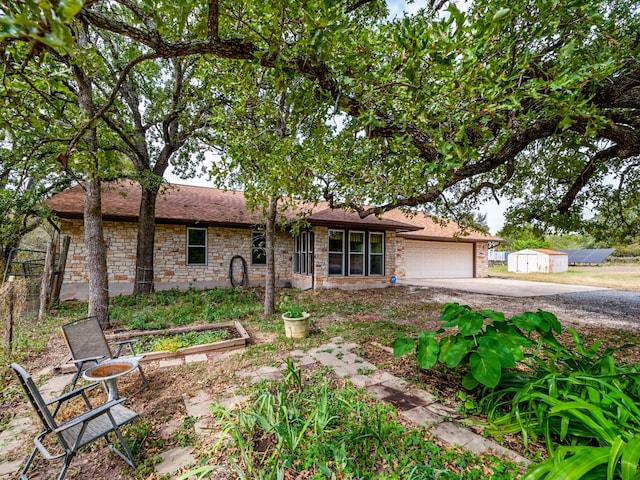 ranch-style home with a garage