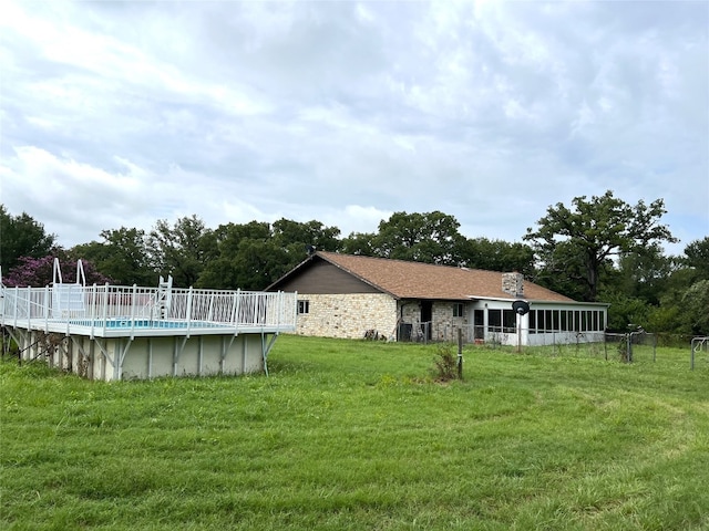 view of yard with a fenced in pool