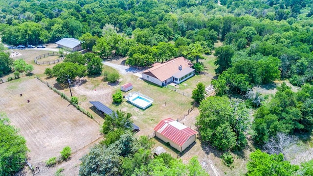298 Jenkins Rd, Cedar Creek, TX 78612 - view from above of property with a forest