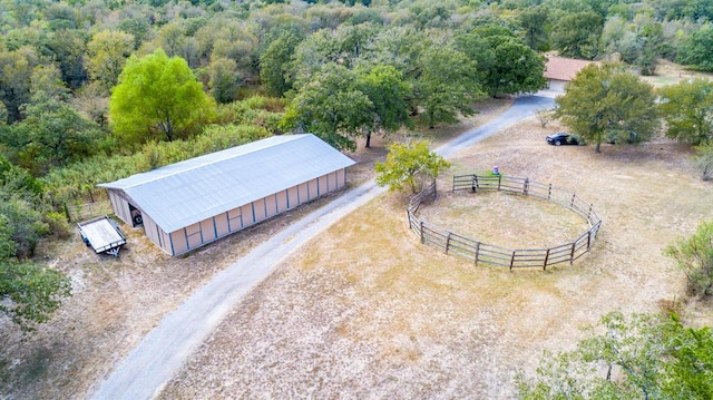 298 Jenkins Rd, Cedar Creek, TX 78612 - aerial view of property and surrounding area with a heavily wooded area