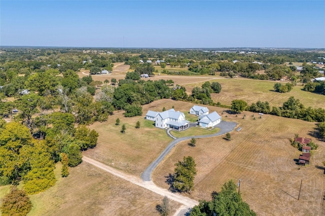 birds eye view of property featuring a rural view