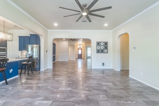 living room with crown molding and ceiling fan with notable chandelier