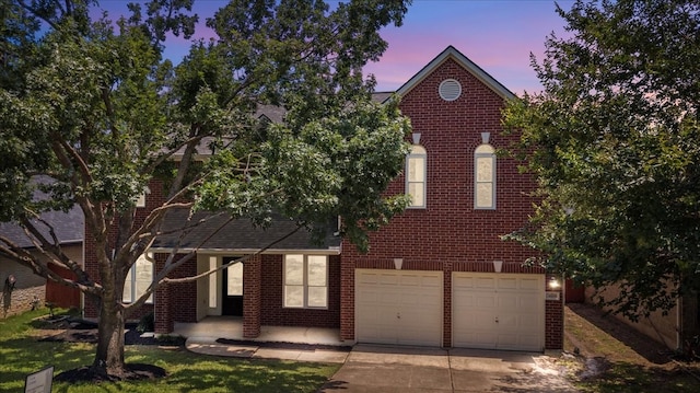 view of front of home featuring a garage