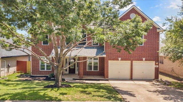 front facade featuring a front lawn and a garage