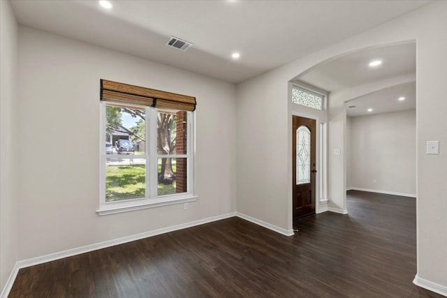 entrance foyer featuring dark wood-type flooring