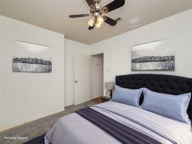 bedroom featuring ceiling fan and carpet floors