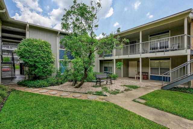 surrounding community featuring a yard and a patio area