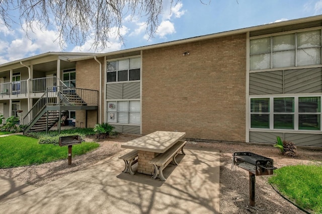 rear view of property with a patio