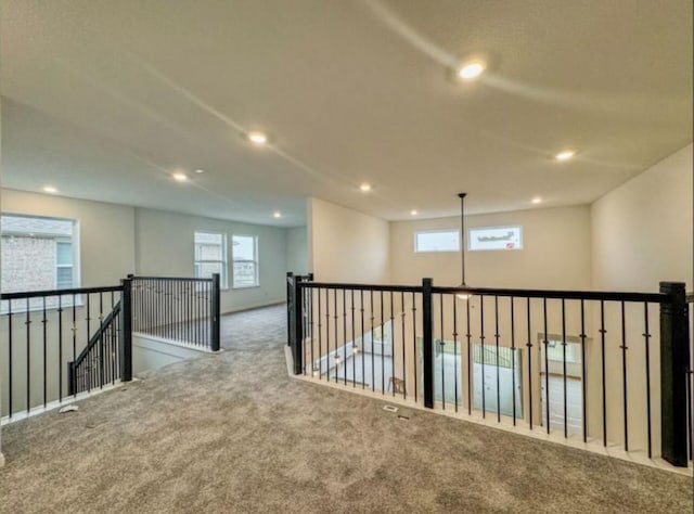 unfurnished room featuring carpet floors and recessed lighting