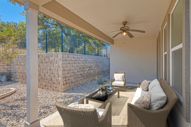 view of patio featuring outdoor lounge area and ceiling fan