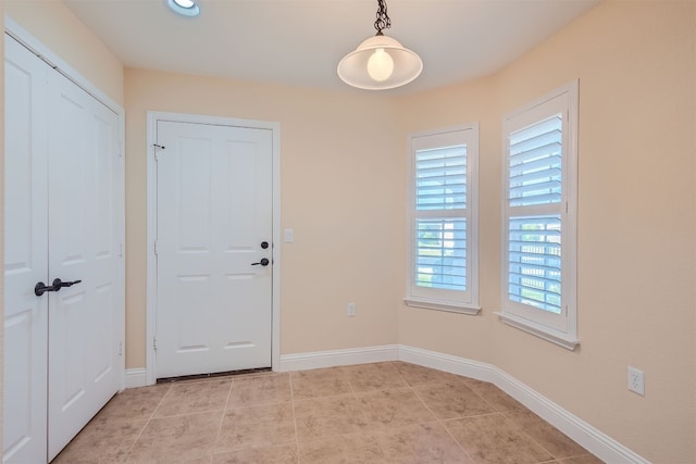 view of tiled spare room