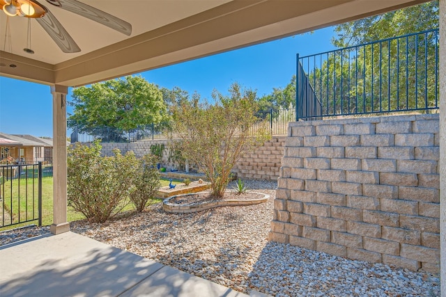 view of patio featuring ceiling fan