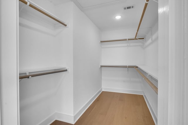 spacious closet featuring wood-type flooring