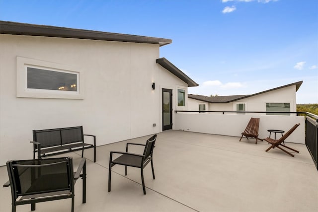 back of house with a patio area