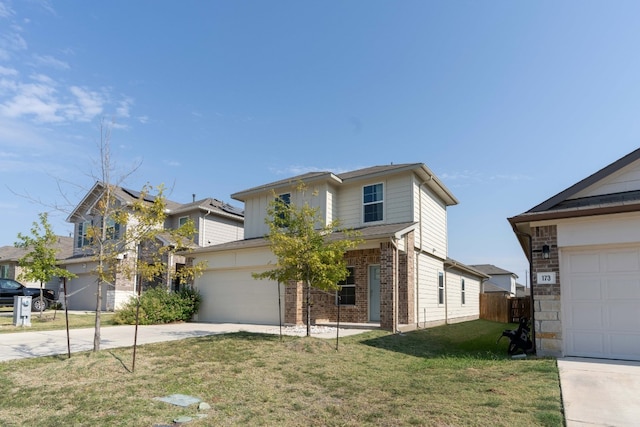 view of front of house with a garage and a front yard