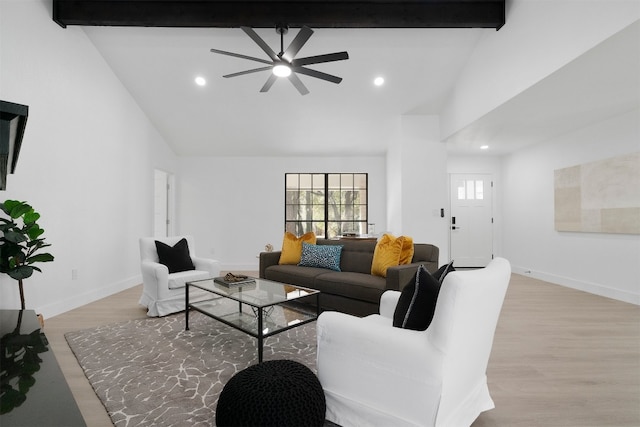 living room with beam ceiling, light hardwood / wood-style flooring, high vaulted ceiling, and ceiling fan