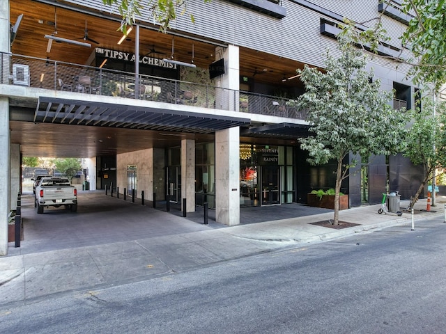 view of property featuring a carport