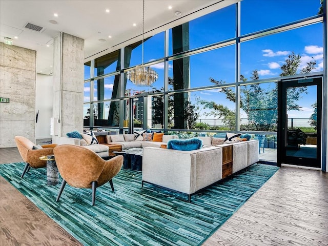 70 Rainey St Unit 1408, Austin, TX 78701 - community lobby with floor to ceiling windows, a towering ceiling, and recessed lighting