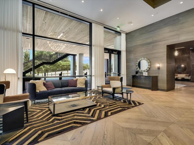 70 Rainey St Unit 1408, Austin, TX 78701 - community lobby with floor to ceiling windows, a towering ceiling, and recessed lighting