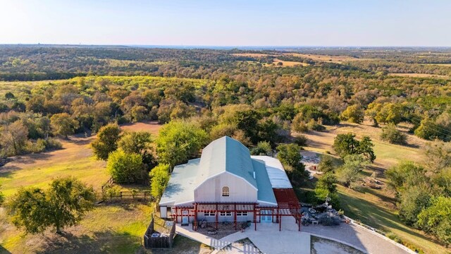 TBD Hibbs Lane, Manor, TX 78653 - aerial view featuring a wooded view