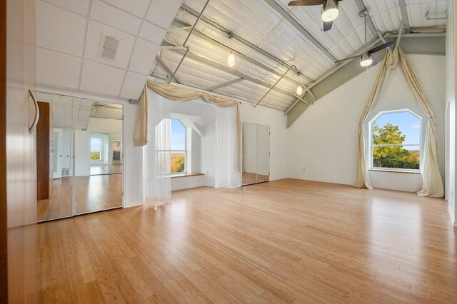 unfurnished living room featuring light hardwood / wood-style floors and ceiling fan