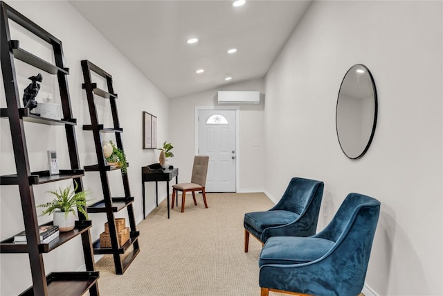 sitting room with recessed lighting, light colored carpet, baseboards, vaulted ceiling, and a wall mounted AC