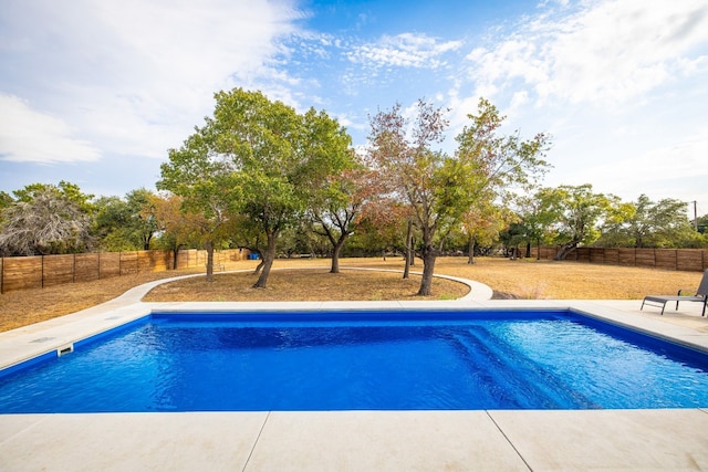 view of swimming pool with a fenced in pool and a fenced backyard