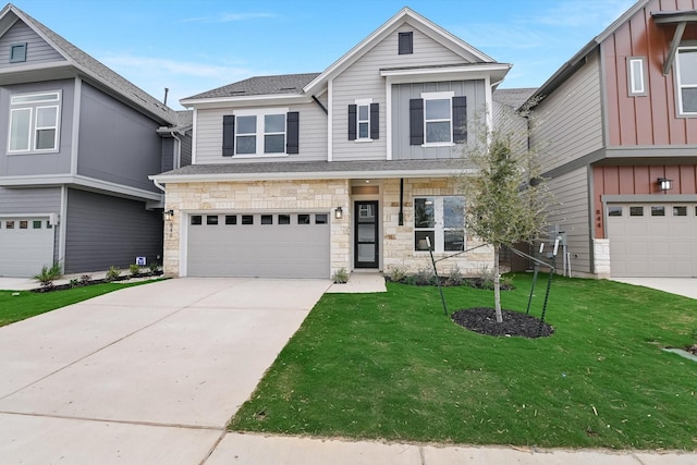 view of front of house with a garage and a front lawn