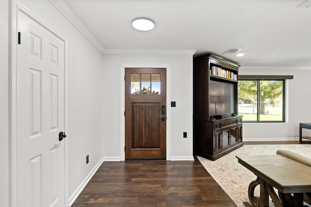 foyer entrance featuring crown molding and dark hardwood / wood-style flooring